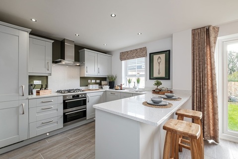 Kitchen & dining in our 4 bed Radleigh home