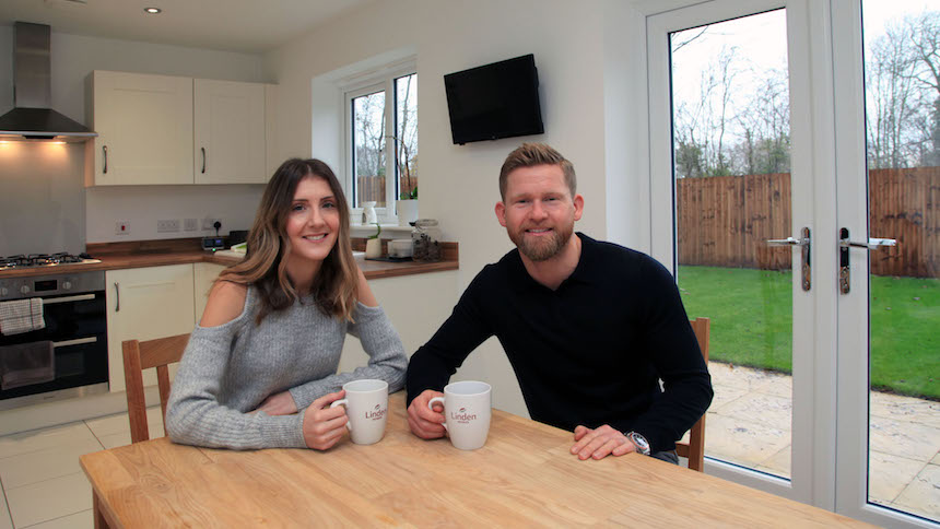 Aaron and Laura in their new home