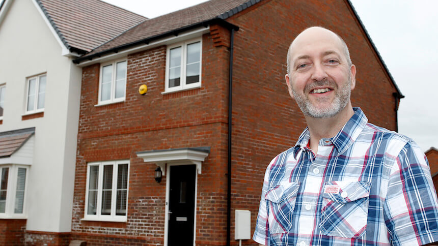 Stephen outside his new home