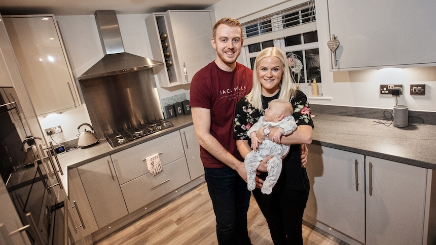 Matt, Katie and baby Ted in their new home