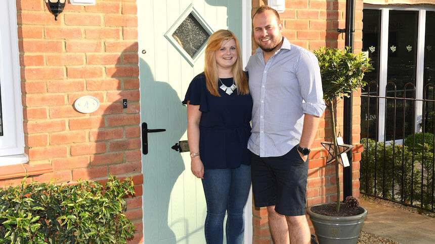 Sarah and Matthew outside their new home