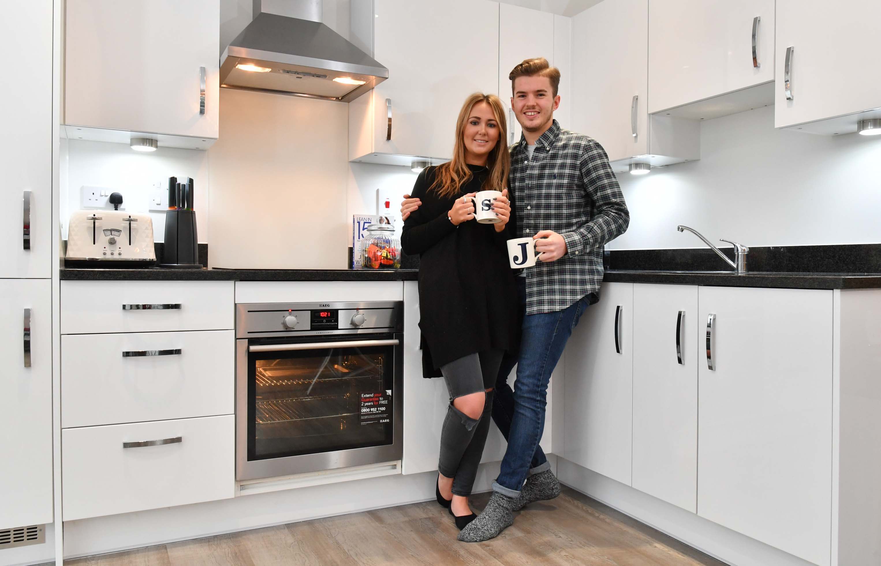 Sian and Joe in their new home (Linden Homes)