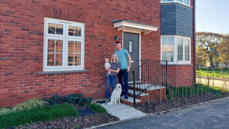 Tom, Megan and Ivy outside their new Cavanna home