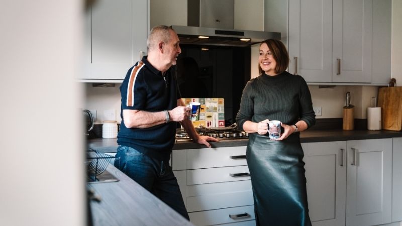 Customers Rosie and Paul in their home at Hilton Valley