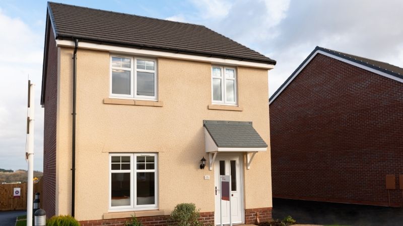 The Long family and Taylor Wimpey sales executive at Sewell Meadow